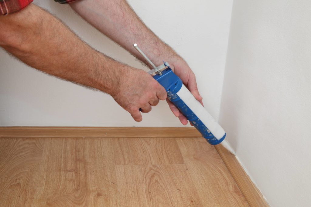 Caulking the baseboards will help get rid of ants overnight.