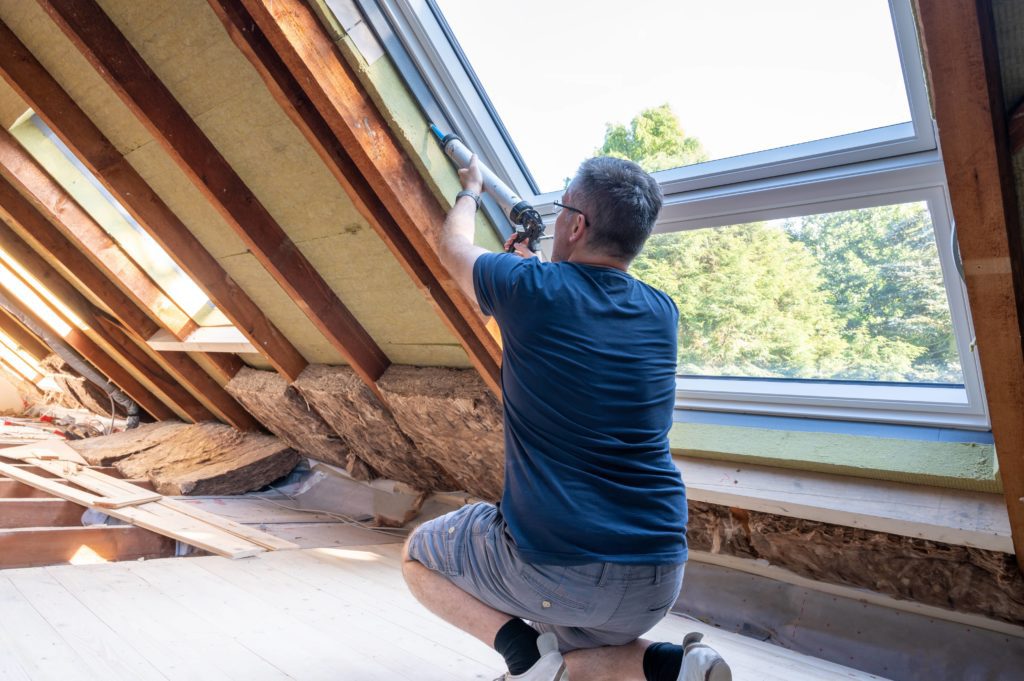 Caulking attic windows can help air seal the attic. 