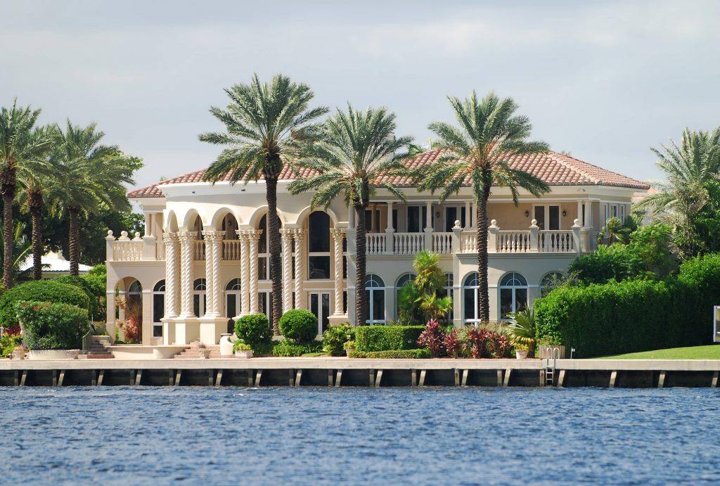 Seawalls mitigate flood damage by protecting the home. 