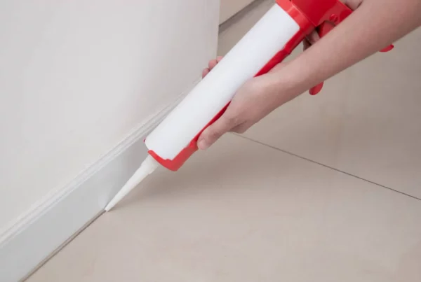 Caulk needs to stay dry in order for it to cure quicker.