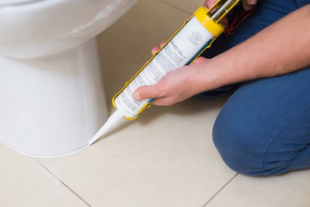 Caulk around the toilet should not get wet before it cures. 